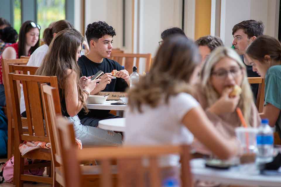 Students grab a bite and hang out at Thea's Abbey dining hall